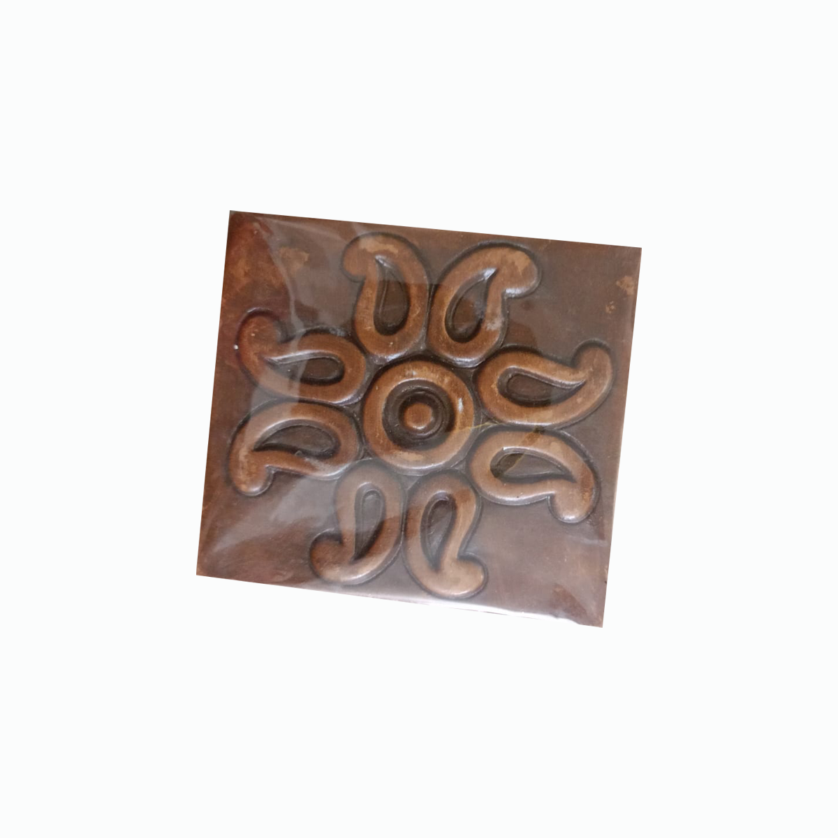 Terracotta plaque carved with an alpana motif